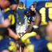 Michigan sophomore quarterback Denard Robinson sits on the during the first half of the Gator Bowl against Mississippi State at EverBank Field in Jacksonville, FL on Saturday. Melanie Maxwell I AnnArbor.com